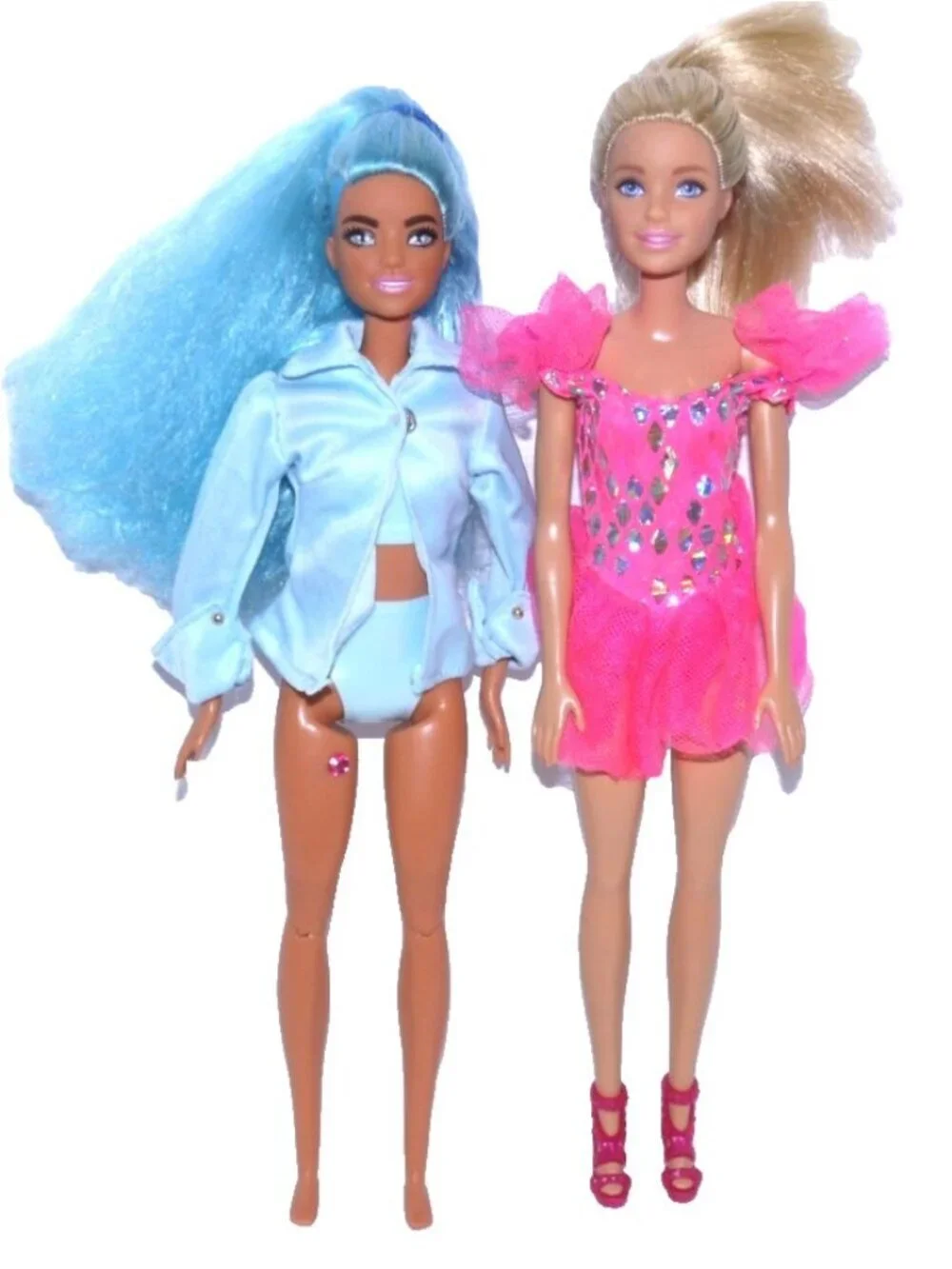 Barbie set of two dolls clothes do not match dolls and some may be vintage As Is